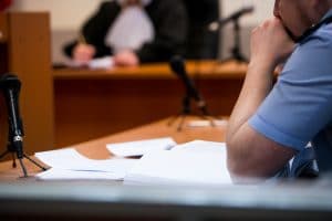 Defendant at an ALR hearing in TX courtroom